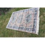 AN EASTERN DESIGN RUG, HAVING GEOMETRIC PATTERN TO THE BORDER, 68INS X 49INS (34840)