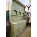 A GREEN PAINTED DRESSER, WIDTH 59INS X DEPTH 20INS X HEIGHT 82.5INS