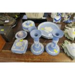 A COLLECTION OF WEDGWOOD JASPERWARE, INCLUDING CANDLE STICKS, CHRISTMAS PLATES, ETC.