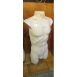 A male bust mannequin