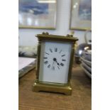 A GILT BRASS CARRIAGE CLOCK, HEIGHT 4.75INS X WIDTH 3INS