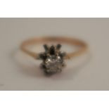 A diamond single stone ring, stamped 'K18', the brilliant cut of approximately 0.2 carats estimated,