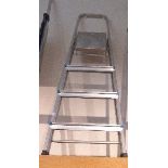 A 4 tread metal step ladder