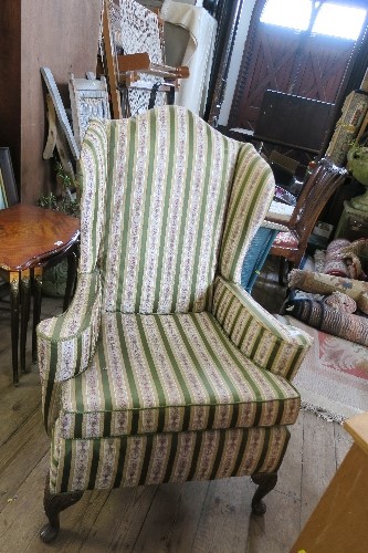 A GEORGIAN DESIGN WING BACK ARMCHAIR