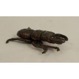 A Japanese bronze model, of a stag beetle, signed, length 2.25ins