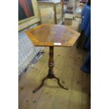 AN HEXAGONAL TOPPED OCCASIONAL TABLE, RAISED ON A TRIPOD BASE, HEIGHT 70INS X MAX WIDTH 15.75INS