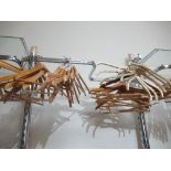 Approximately forty various coat hangers