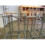 A quantity of chrome free standing display rails