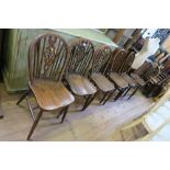 A SET OF 6 WHEEL BACK DINING CHAIRS