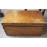 A 19th century hardwood travelling chest, fitted with ornate brass corners and straps, width 35.