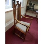 A set of 10 (8 + 2) light oak dining chairs, with lathe back