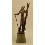 A Lorenzl patinated spelter figure, of a lady skier, on a marble base, height 9.5insCondition