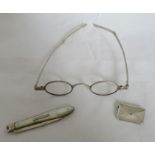 A pair of silver framed glasses, with double hinged arms, London 1824, together with a Victorian