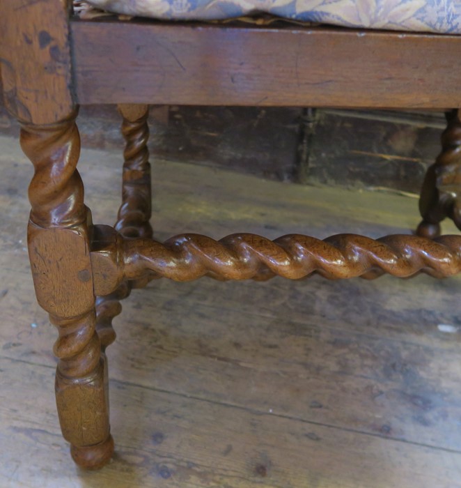An antique Carolean style walnut bergere open armchair, with all over barley twist turnings and - Image 3 of 3