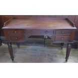 A 19th century mahogany tray top wash stand, fitted with a central drawer, flanked by two short