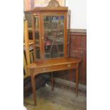 A late 19th century mahogany glazed corner cupboard, with canted sides and a pierced frieze, width