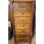 A 19th century burr walnut Wellington chest, having an associated top, fitted with seven drawers,