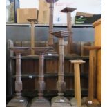 A quantity of carved wooden display stands