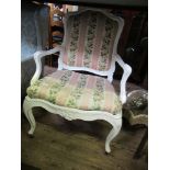 A PAINTED OPEN ARMCHAIR, WITH FLORAL UPHOLSTERY