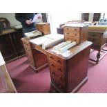 A 19th century mahogany dressing table, having two banks of three drawers, with a central drawer