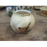 A Royal Worcester vase, shape G161, decorated with a Robin, height 3ins