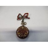 A Swiss 935 silver and enamel fob watch, on an enamelled ribbon bow brooch fitting