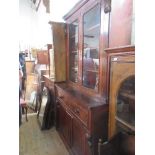 A 19th century mahogany glazed cabinet, with cupboard below