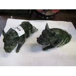 Two malachite models of pigs