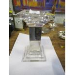 A modern hallmarked silver and glass candlestick