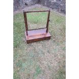 A 19th century swing frame toilet mirror.