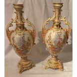 A pair of 19th century continental blush ivory vases, decorated with flowers, height
