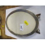 A hallmarked silver oval picture frameCondition Report: 8ins x 5.25ins.   Various scuffs and dents