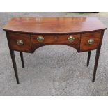 A 19th century mahogany bow front sideboard, fitted with three drawers, the whole with satinwood