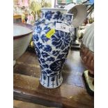 A 19th century Chinese blue and white vase, decorated with lizards to the shoulders, character marks