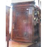 A 19th century corner cupboard