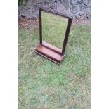 A 19th century swing frame toilet mirror