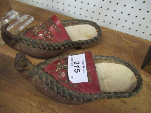 A pair of Eastern design clogs