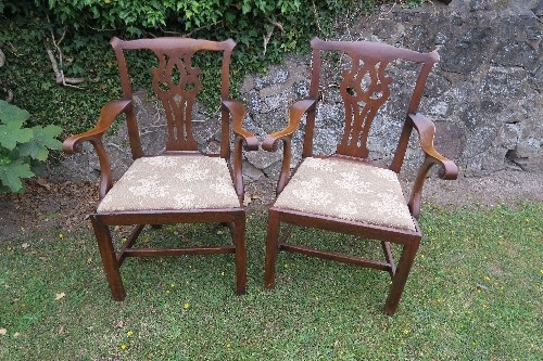 A pair of Chippendale style 19th century mahogany armchairs, with makers label Spillman and Co.