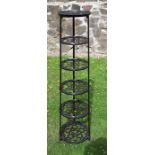 A metal six tier pot stand, with pierced shelves, height 48ins