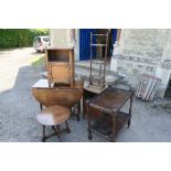 A collection of furniture to include Old Charm bedside cabinet, gate leg table, tea trolley, cake