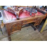 A desk, with leather top