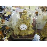 A gilt mantle clock