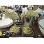 A pair of modern brass models of cranes, on marble plinths, made in Italy, height 13ins