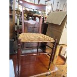 A 19th century bar back chair , with caned seat