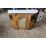 A Victorian marble top walnut credenza, with glazed door, flanked by shelves over cupboards, the