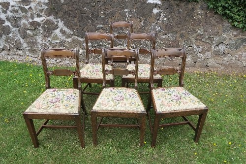 A set of six Regency design dining chairs