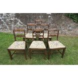 A set of six Regency design dining chairs