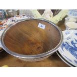 An Edwardian carved wooden bowl, with silver base and rim, London, 1911