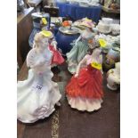 Four Royal Doulton figures