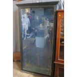 A floor standing display case, with large glazed door, height 72ins, width 39.5ins